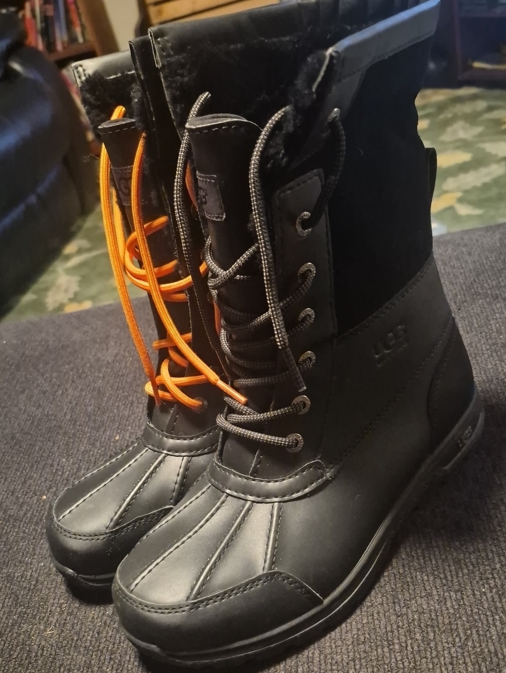 UGG Black Boots with Orange Lace Accent